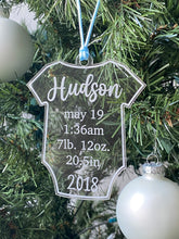 Custom Acrylic New Baby Details Christmas Ornament, featuring personalized details like baby’s name, birthdate, and weight. A unique keepsake to celebrate a newborn’s first Christmas, this ornament adds a special touch to holiday decor. Perfect as a thoughtful gift for new parents or a family keepsake."