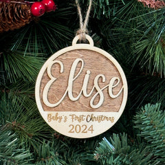 Baby's First Christmas Ornament with multiple design options, personalized with baby’s name, year, and 'Baby’s First Christmas' text. A charming keepsake to celebrate a newborn’s first holiday season, offering a variety of designs to suit every style. Perfect for adding a special touch to Christmas trees and holiday decor.