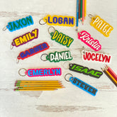 Acrylic Backpack Name Tags for kids, customizable with their name for a fun and personalized touch. These durable name keychains are perfect for backpacks, water bottles, lunchboxes, or gym bags. A great way to help kids keep track of their belongings while adding a colorful, unique flair to their school gear.