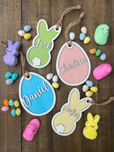 Personalized Wood Easter Basket Tags in a variety of shapes and colors, perfect for adding a unique and festive touch to Easter baskets. These custom tags can be personalized with names or special messages, making them a great addition to your Easter celebrations or as thoughtful gifts.