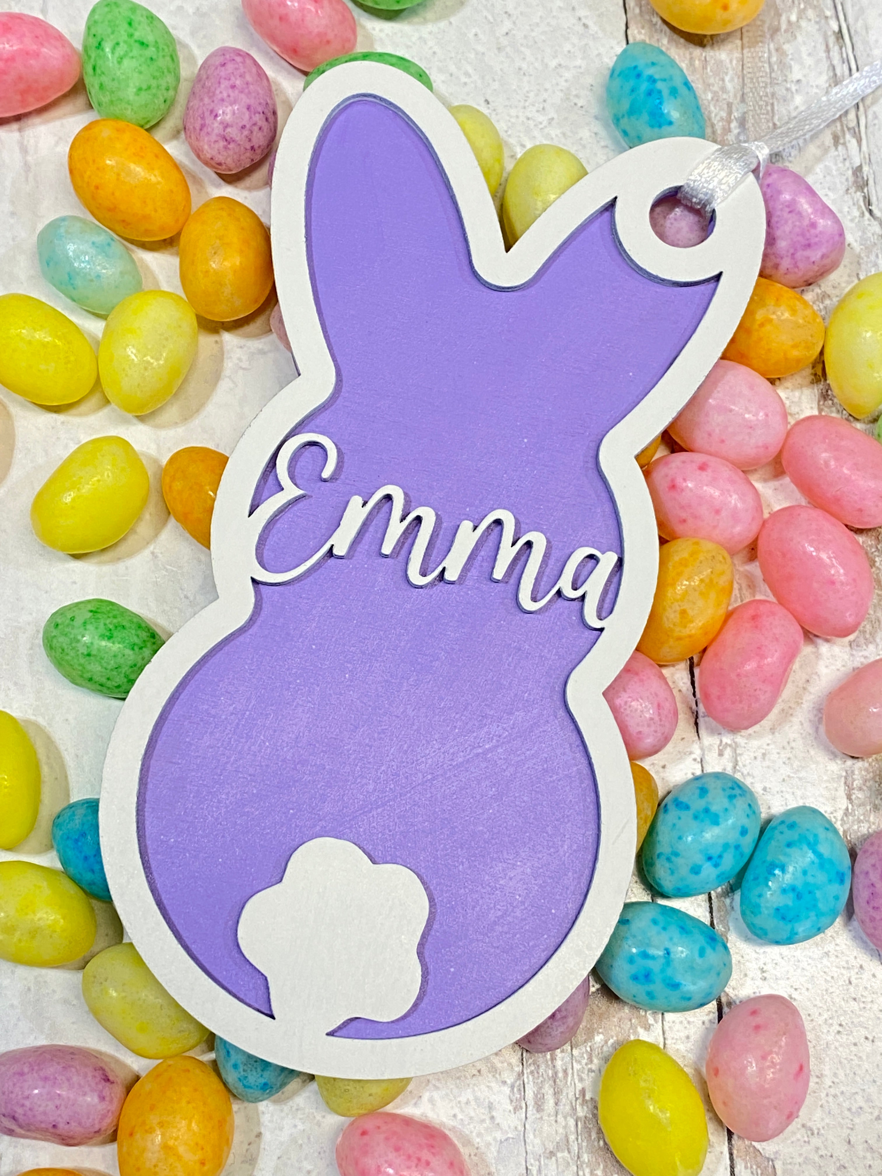 Personalized Wood Easter Basket Tags in a variety of shapes and colors, perfect for adding a unique and festive touch to Easter baskets. These custom tags can be personalized with names or special messages, making them a great addition to your Easter celebrations or as thoughtful gifts.