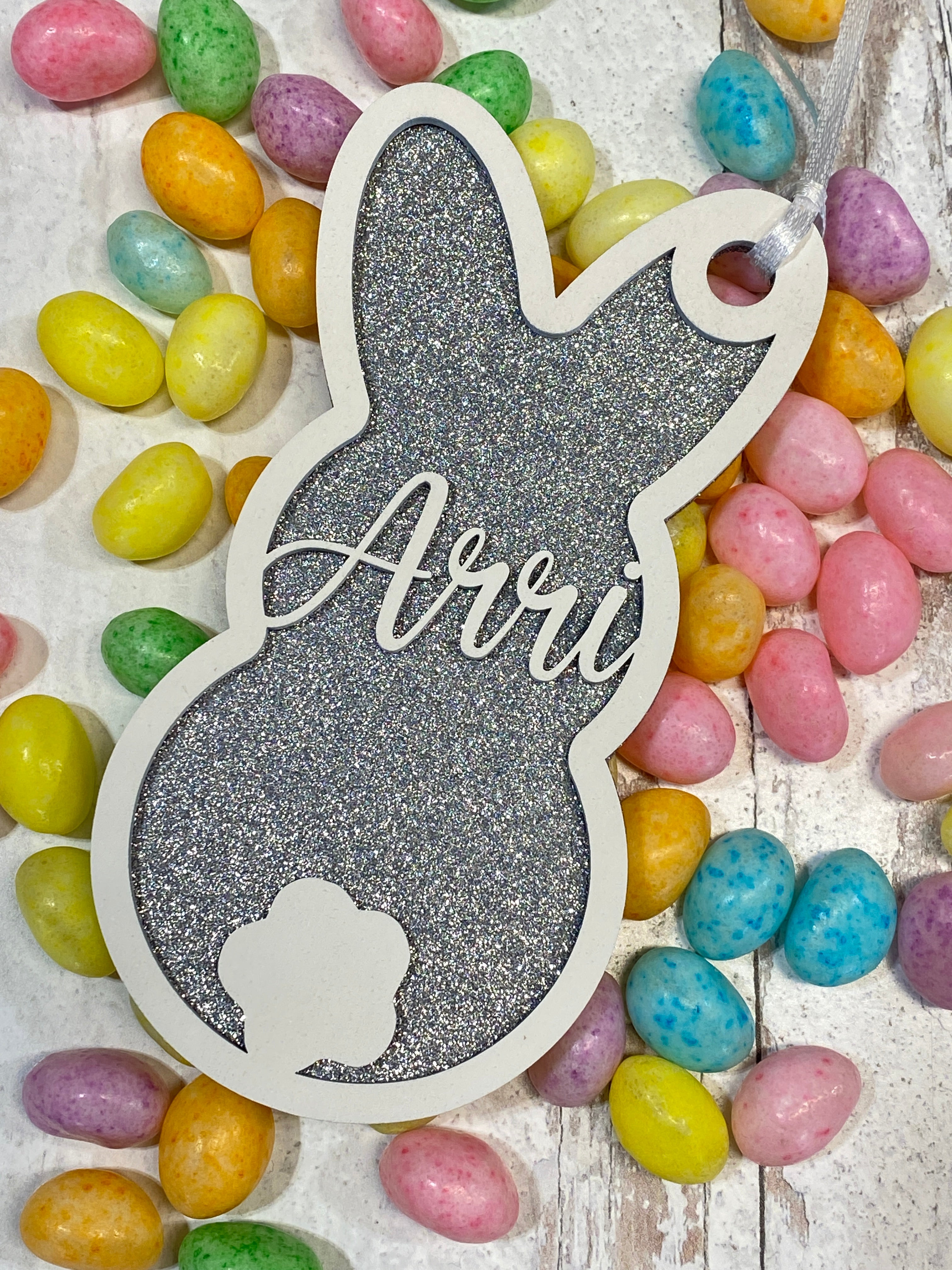 Personalized Wood Easter Basket Tags in a variety of shapes and colors, perfect for adding a unique and festive touch to Easter baskets. These custom tags can be personalized with names or special messages, making them a great addition to your Easter celebrations or as thoughtful gifts.