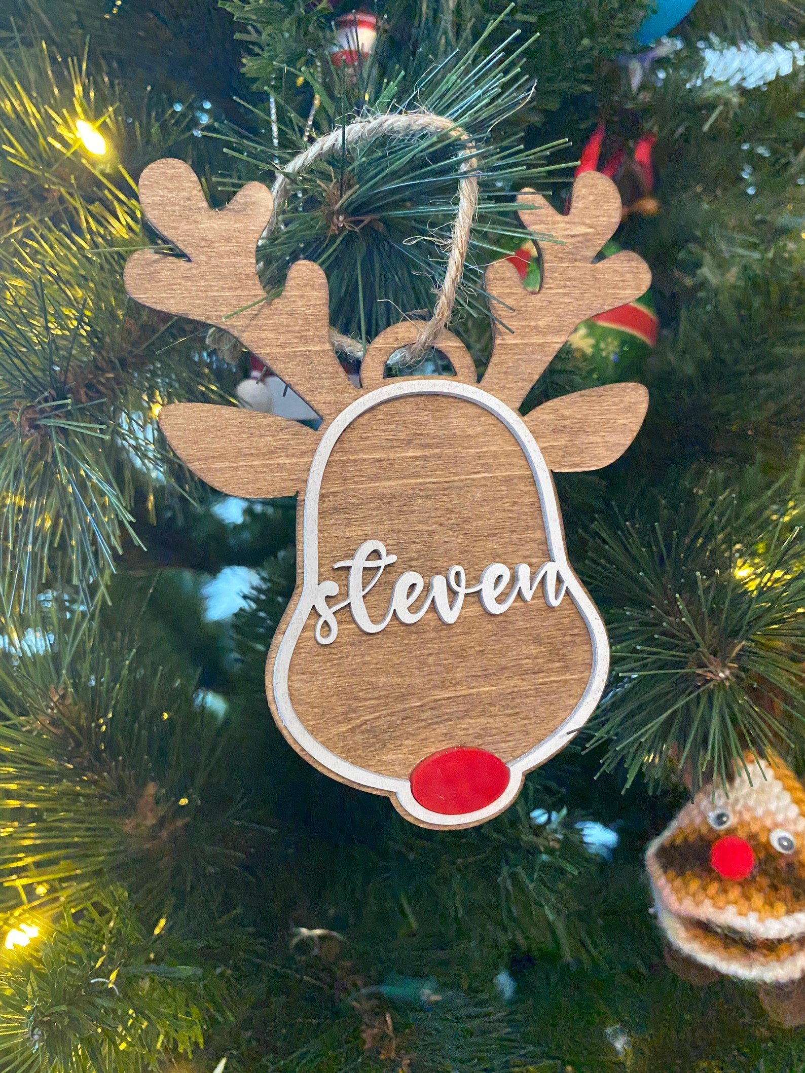 Custom Reindeer Ornament, personalized with names, dates, or special messages. A festive and unique keepsake to celebrate the holiday season, perfect for adding a personal touch to your Christmas tree or giving as a thoughtful gift.