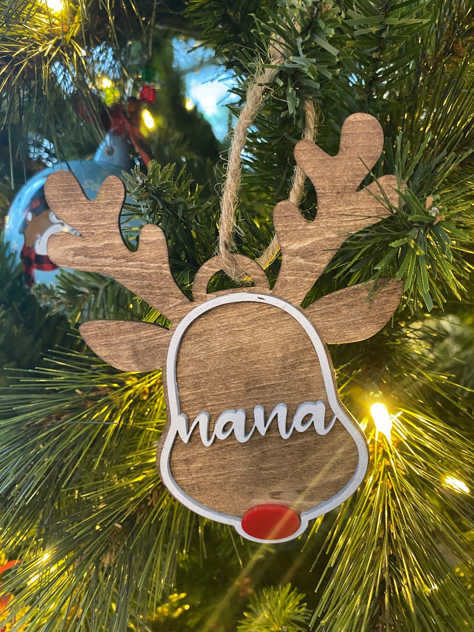 Custom Reindeer Ornament, personalized with names, dates, or special messages. A festive and unique keepsake to celebrate the holiday season, perfect for adding a personal touch to your Christmas tree or giving as a thoughtful gift.