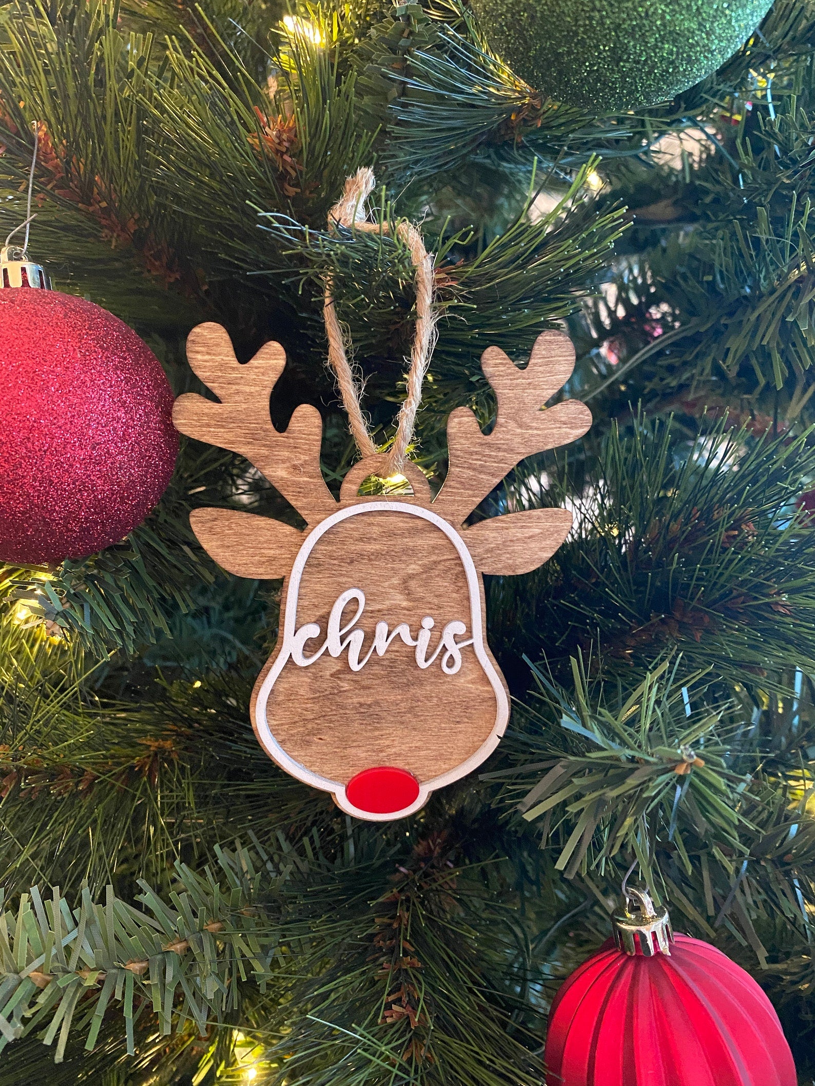 Custom Reindeer Ornament, personalized with names, dates, or special messages. A festive and unique keepsake to celebrate the holiday season, perfect for adding a personal touch to your Christmas tree or giving as a thoughtful gift.
