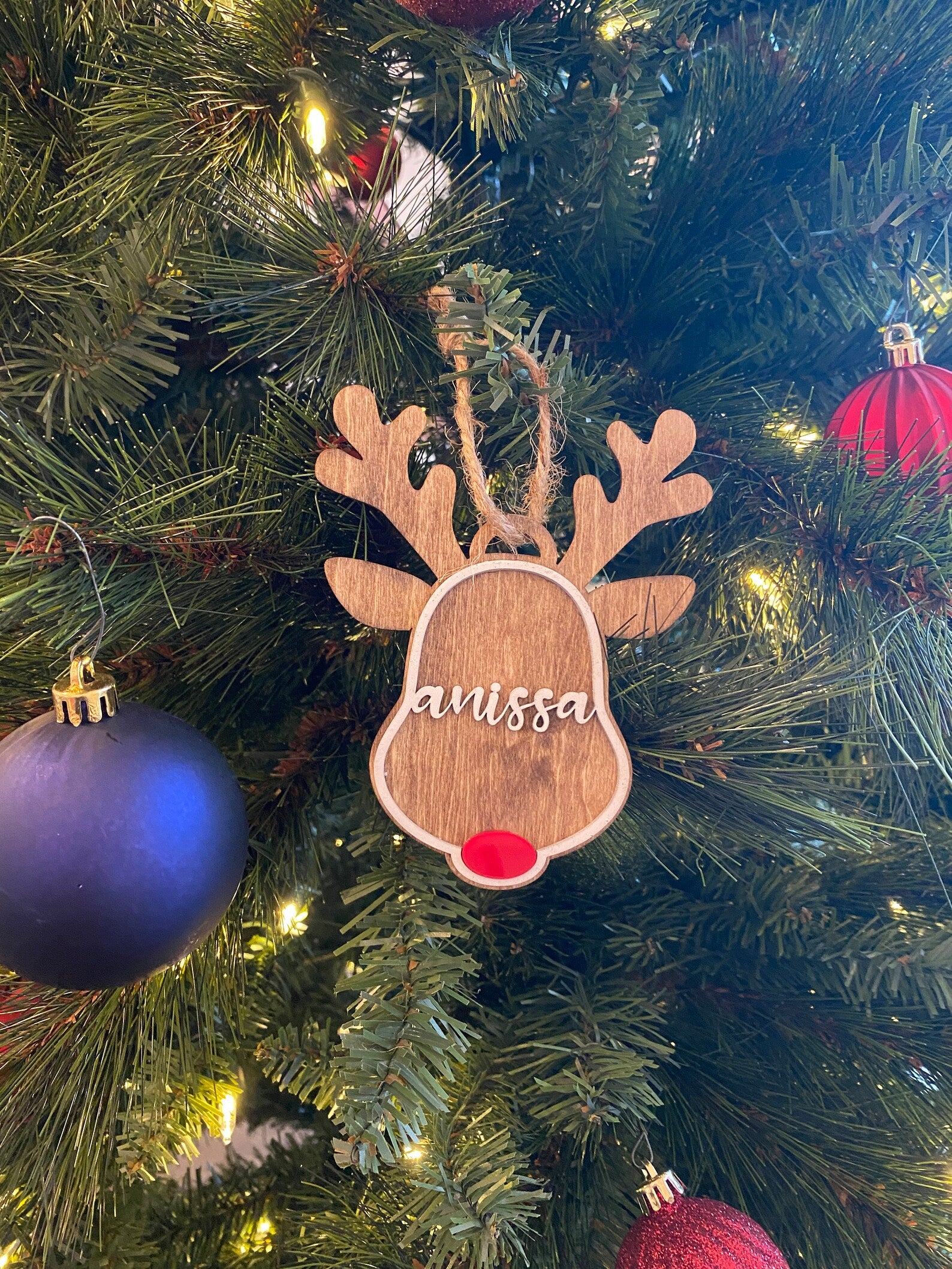Custom Reindeer Ornament, personalized with names, dates, or special messages. A festive and unique keepsake to celebrate the holiday season, perfect for adding a personal touch to your Christmas tree or giving as a thoughtful gift.
