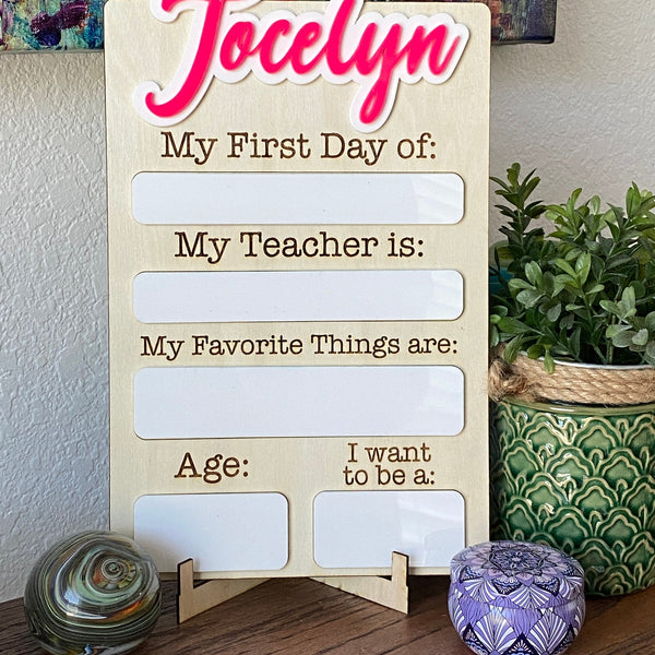 Custom School Sign Photo Prop for kids, featuring a reusable design with space for personalizing with their name. Perfect for celebrating the first day of school, this photo prop helps capture memorable moments while adding a personal touch to back-to-school photos.