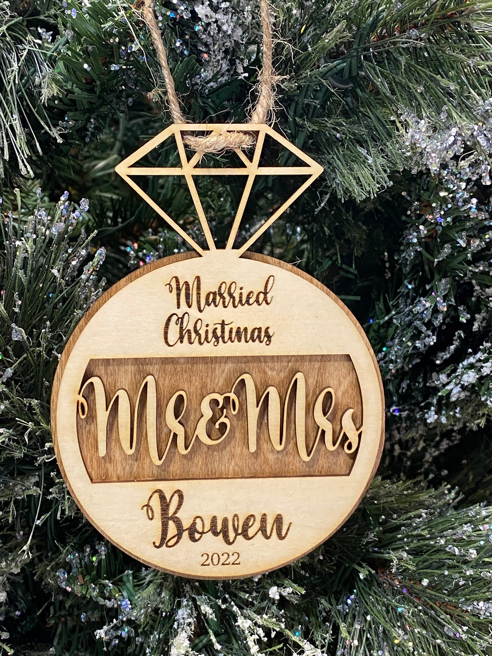 Newlywed Couple Gift, a personalized Just Married Christmas Ornament, perfect for celebrating the first holiday season together. An ideal wedding or bridal shower gift, this keepsake adds a special touch to the couple's Christmas tree and commemorates their new life together.