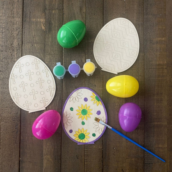Paint Yourself Wood Easter Eggs, perfect for kids' Easter crafts. These wooden eggs come with stands and are ready to be painted, offering a fun and creative activity for children to celebrate the holiday. Ideal for Easter decorations or as personalized gifts.