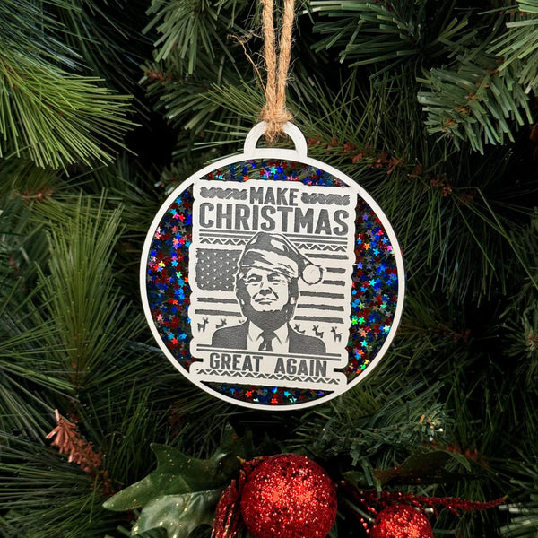 Donald Trump Christmas Ornament featuring the "Make Christmas Great Again" slogan. A fun and unique keepsake for political supporters, perfect for adding a personal touch to your holiday decor or giving as a gift to fans of Donald Trump.