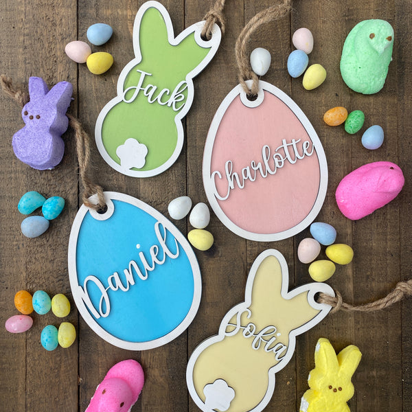 Personalized Wood Easter Basket Tags in a variety of shapes and colors, perfect for adding a unique and festive touch to Easter baskets. These custom tags can be personalized with names or special messages, making them a great addition to your Easter celebrations or as thoughtful gifts.